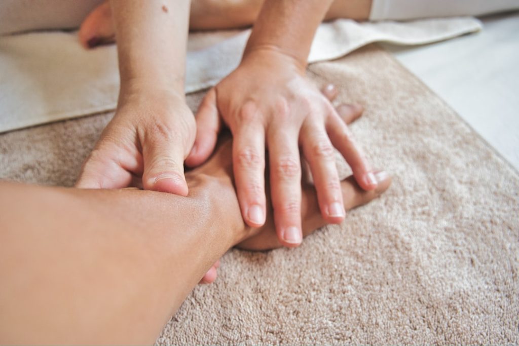 persons-hand-on-persons-lap-ubeslmfs1lk